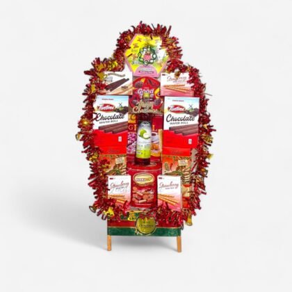 Parcel makanan susun tinggi isi sirup marjan good time dan biskuit kaleng dengan hiasan rumbai merah